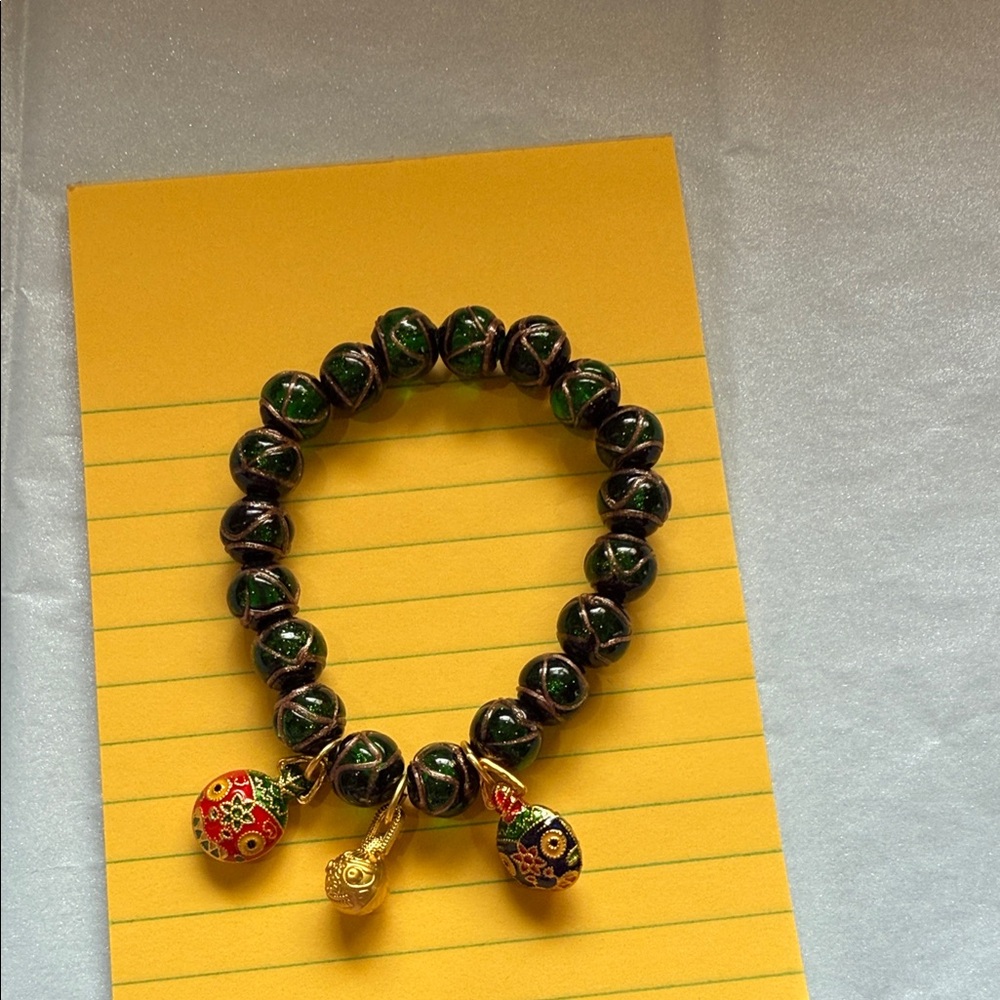 Charming Beaded Bracelet with Gold and Red Charms